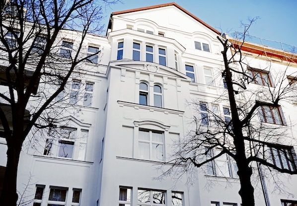A multi-story building with a classical architectural style, featuring symmetrical windows and a central entrance. - Provocateur, Berlin, a part of Sircle Collection (Berlin)