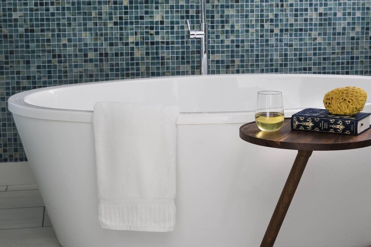 lark suite | bathroom | hair dryer, bathrobes, heated floors, towels