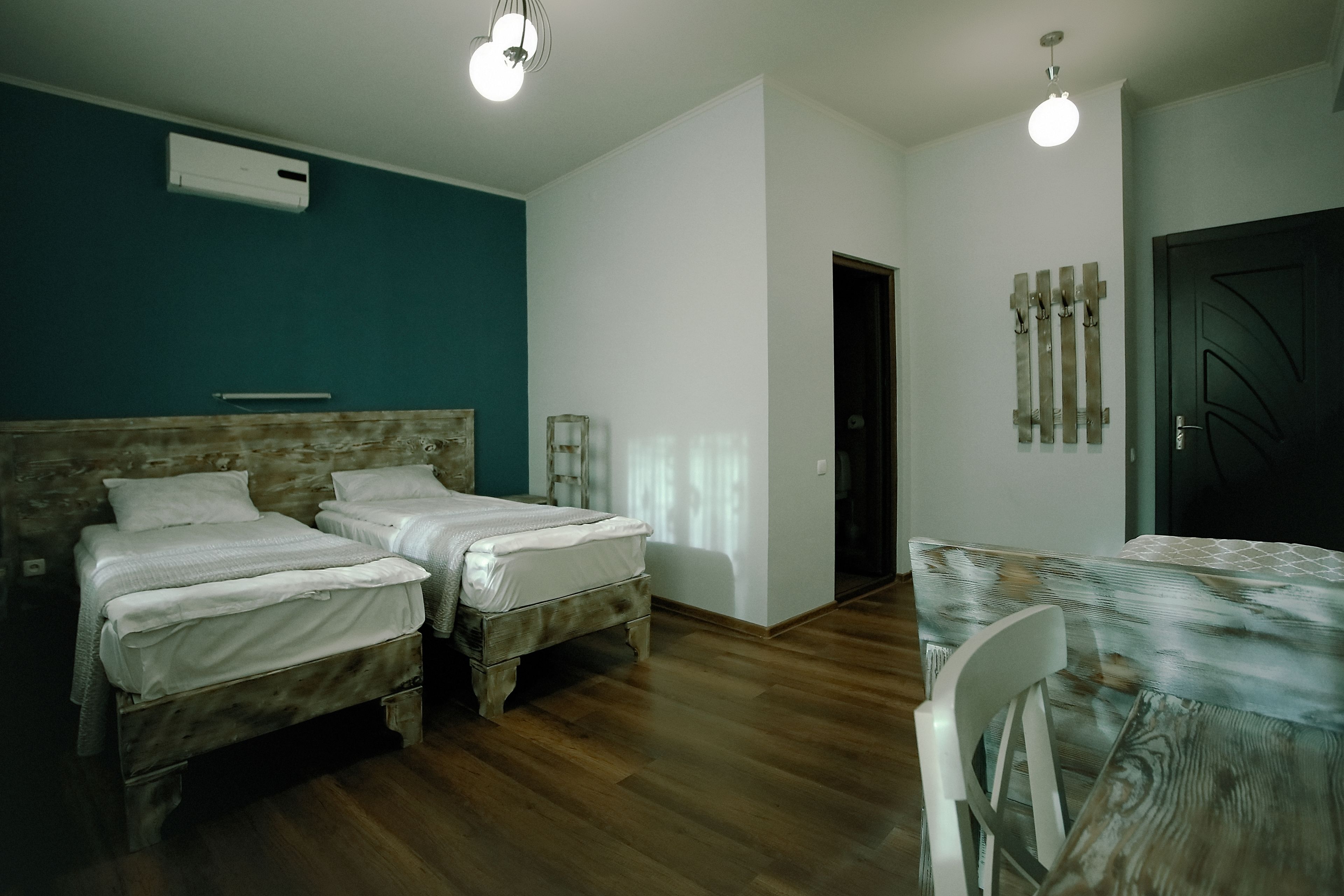 standard triple room | 1 bedroom, minibar, desk, blackout curtains