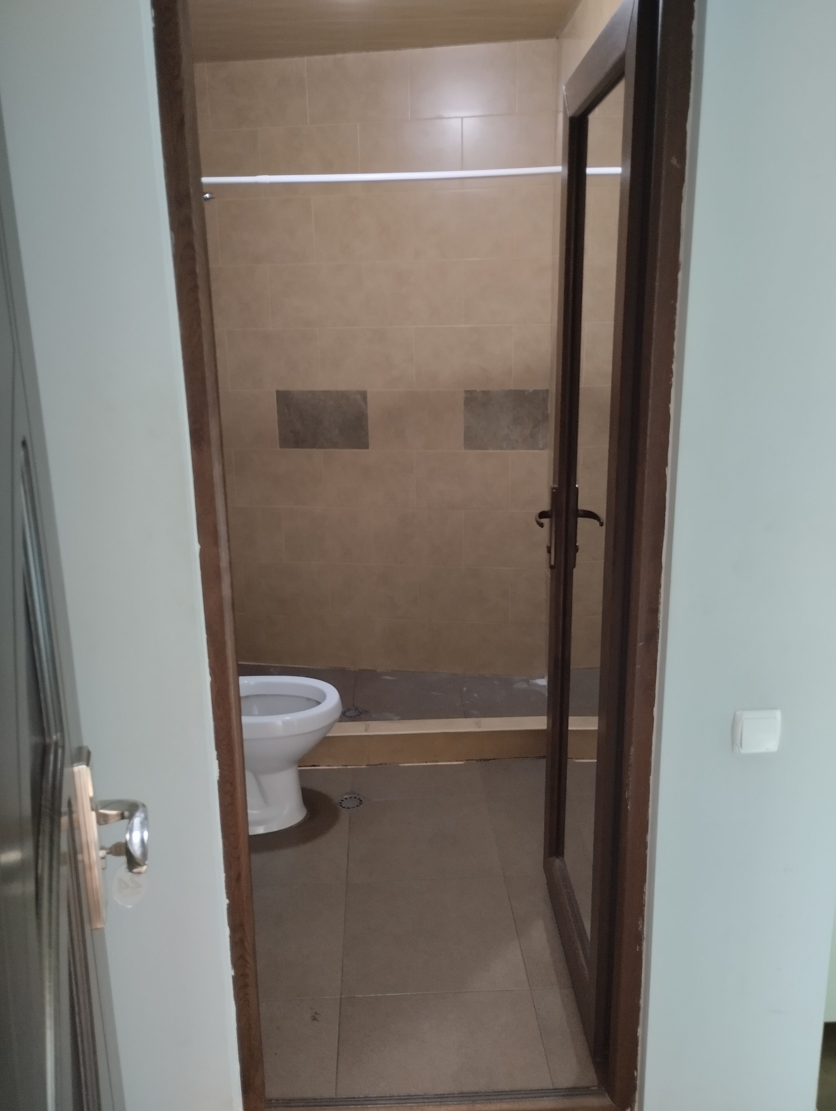 economy double room | bathroom | shower, free toiletries, hair dryer, slippers