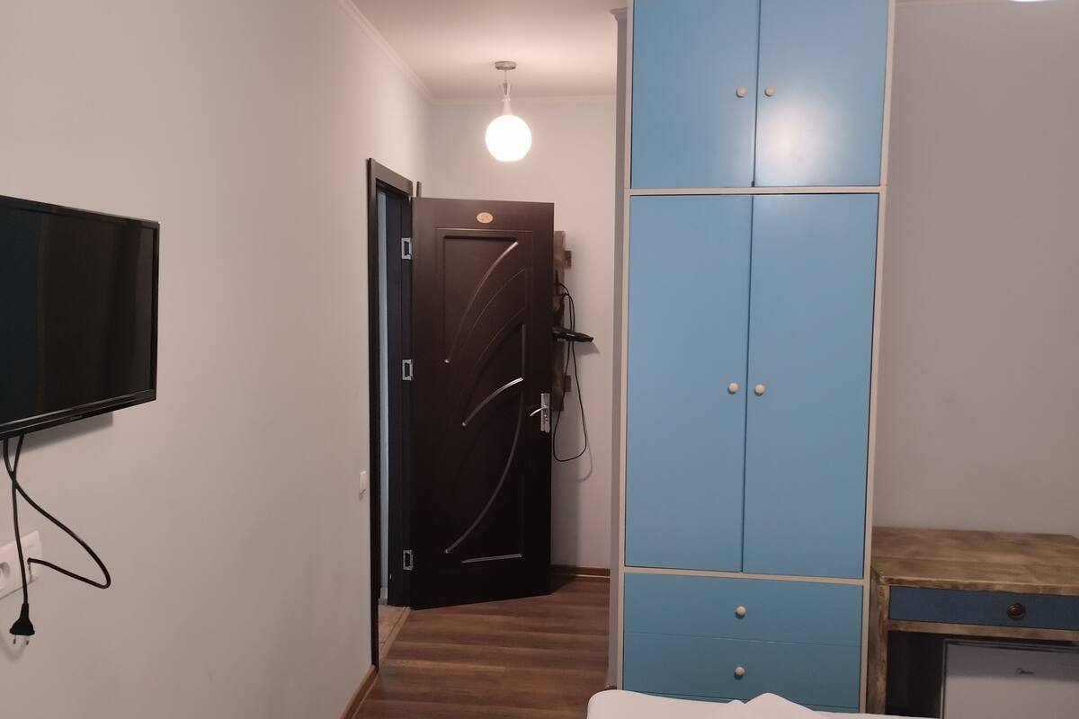economy double room | 1 bedroom, minibar, desk, blackout curtains