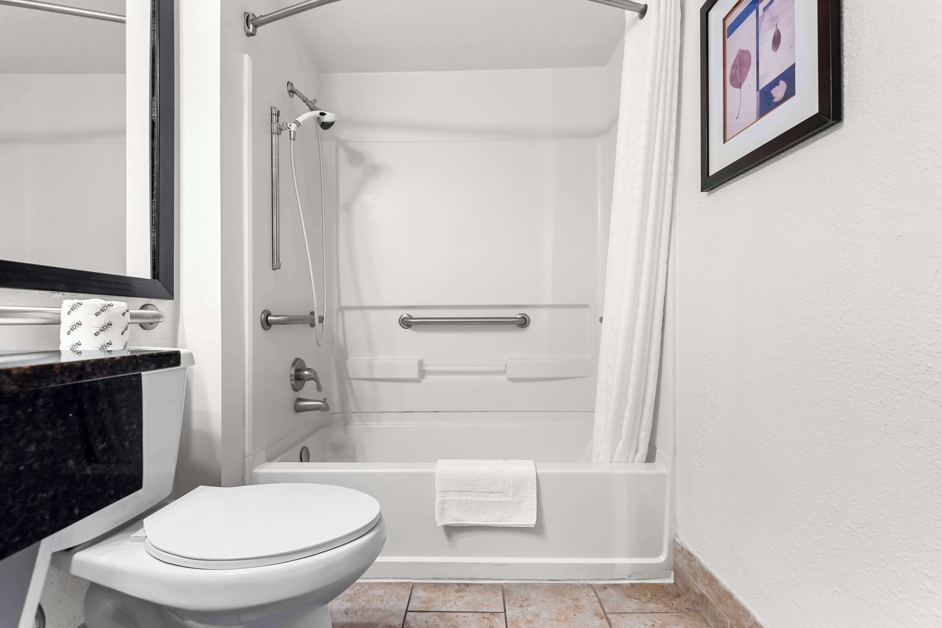 combined shower/bathtub, free toiletries, hair dryer, towels