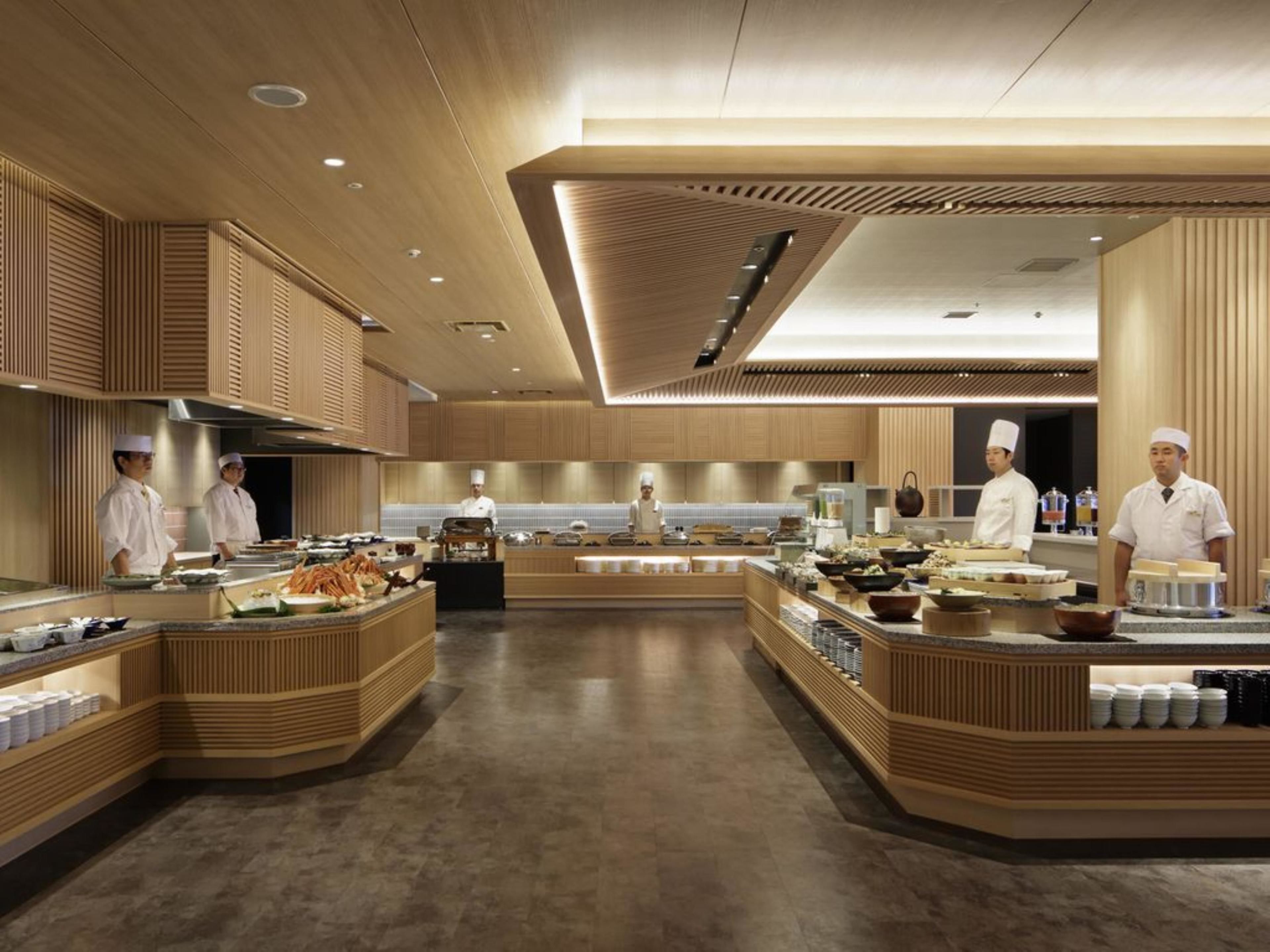 Une cuisine moderne avec des meubles en bois et un îlot central.