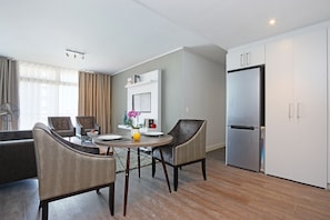Classic Apartment, 2 Bathrooms | Living room | Flat-screen TV - The Verge Aparthotel (Cape Town)