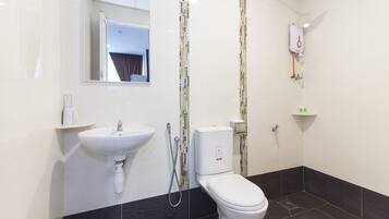 Suite familiar | Baño | Ducha y toallas