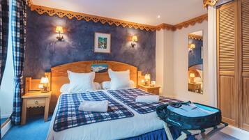 Minibar, coffres-forts dans les chambres, bureau, rideaux occultants