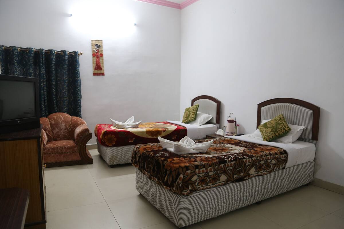 Exclusive Room, Garden View, Garden Area (1 Twin bed) | Iron/ironing board, rollaway beds, free WiFi
