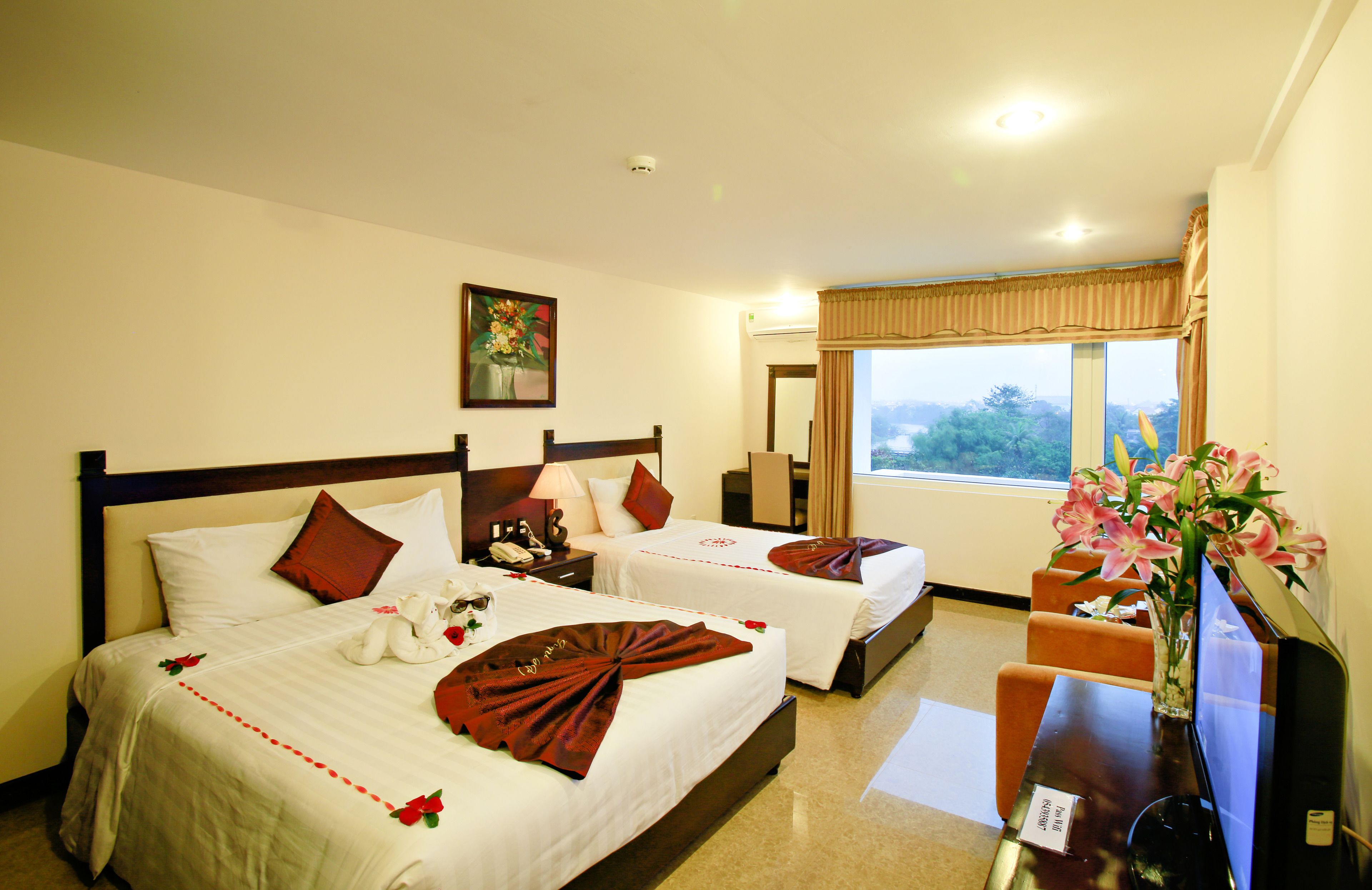 family triple room | minibar, in-room safe, desk, blackout curtains