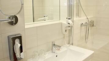 Shower, hair dryer, bathrobes, towels