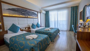 Minibar, desk, bed sheets