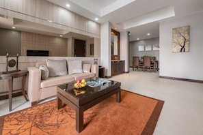 Executive Suite, 1 King Bed | Living area | 40-inch flat-screen TV with satellite channels, TV - Grand Asoke Suites Boutique Residence (Bangkok)