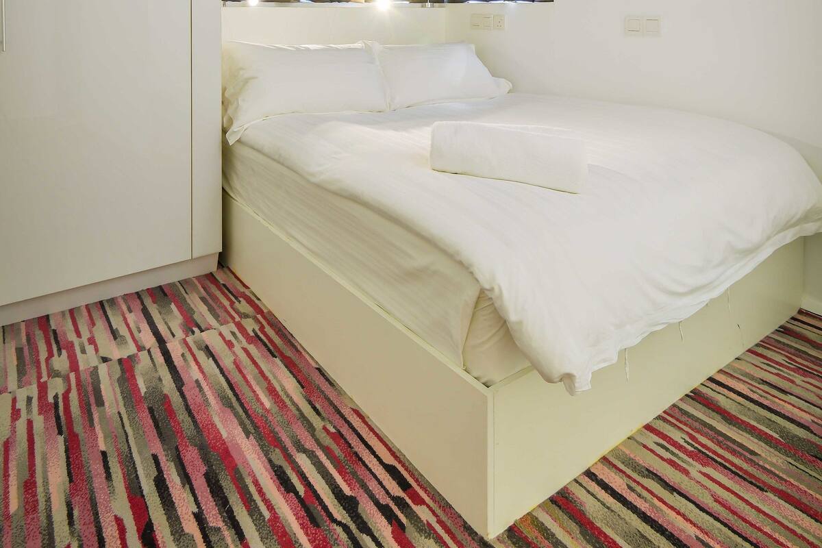Habitación superior | Ropa de cama de alta calidad, minibar y escritorio 