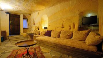 Family Suite (Turkish Bath) | Living area | TV, toys, heated floors