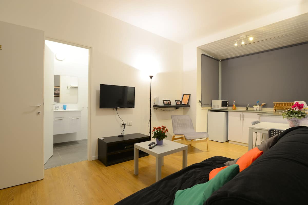 Apartment, 1 Bedroom (Arlozerov near the sea) | 1 bedroom, in-room safe, blackout drapes, iron/ironing board