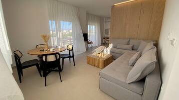 Comfort appartement | Woonruimte | Een flatscreentelevisie