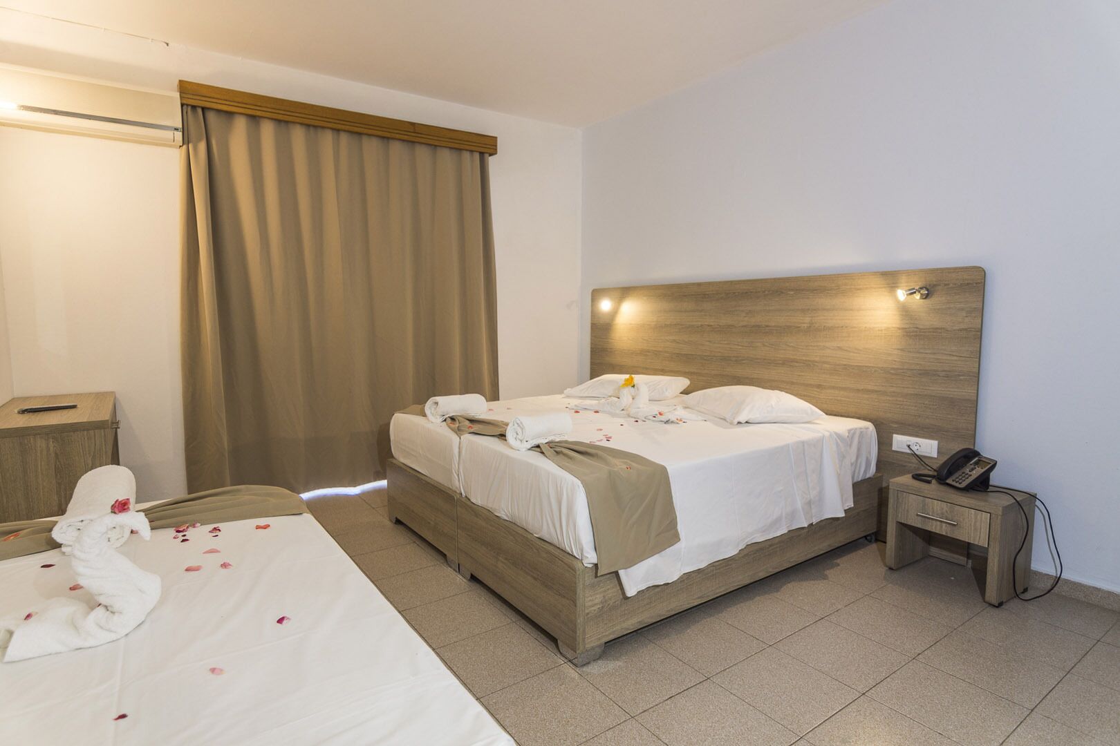 deluxe triple room, pool view | 3 bedrooms, iron/ironing board, free wifi, bed sheets