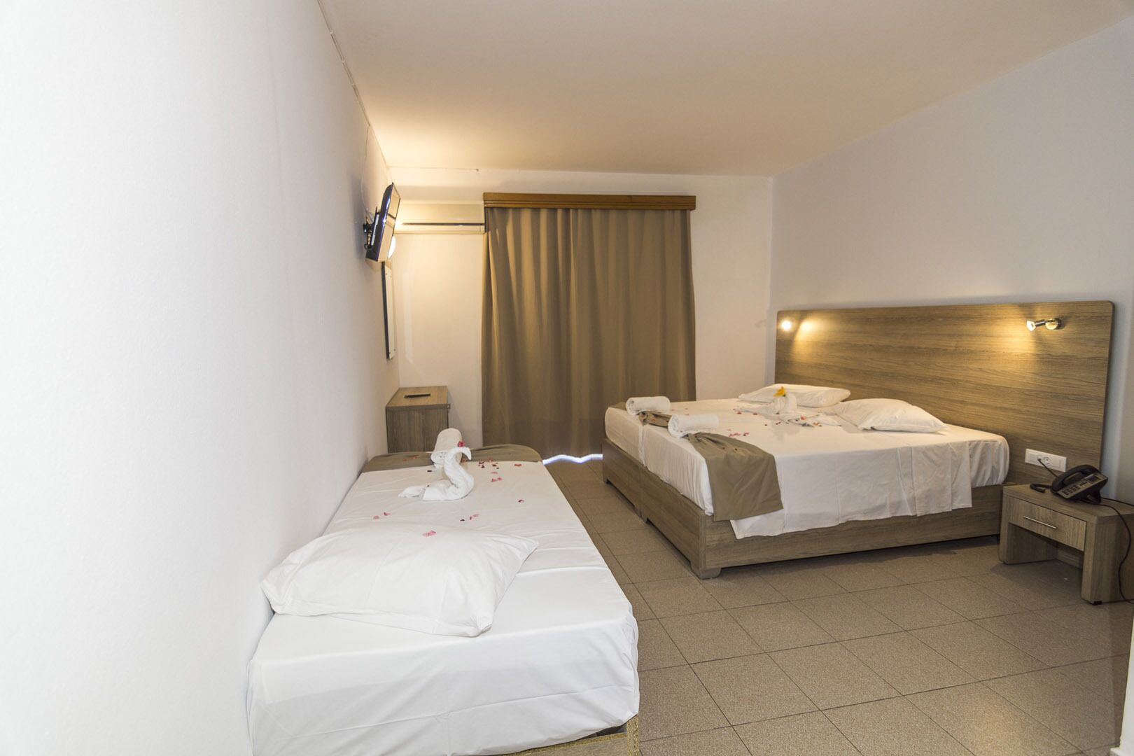 deluxe triple room, pool view | 3 bedrooms, iron/ironing board, free wifi, bed sheets