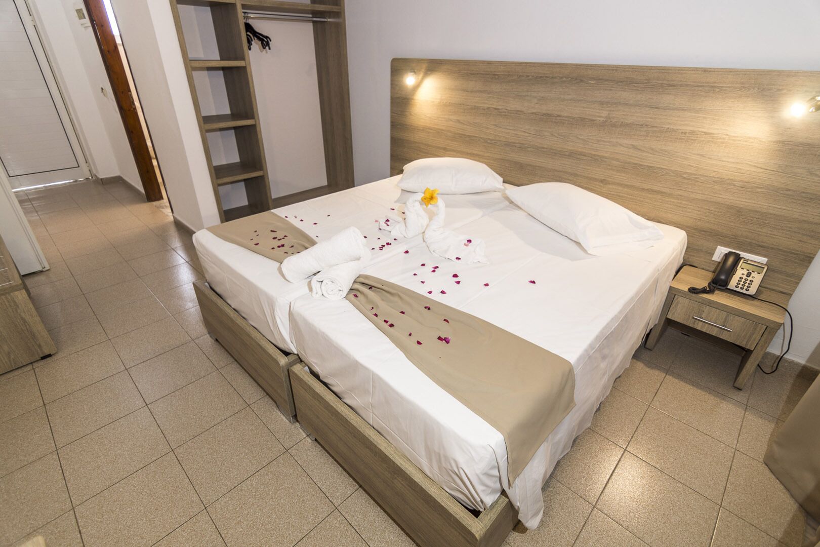 deluxe triple room, pool view | 3 bedrooms, iron/ironing board, free wifi, bed sheets