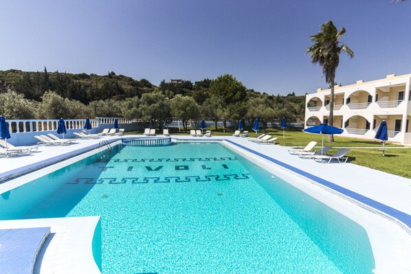 Outdoor pool, pool umbrellas, pool loungers