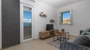 Flat-screen TV, video game console