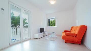 Superior Apartment, 2 Bedrooms, Balcony, Sea View | Living area | Flat-screen TV, video game console
