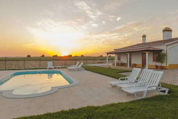 Outdoor pool, pool umbrellas, pool loungers