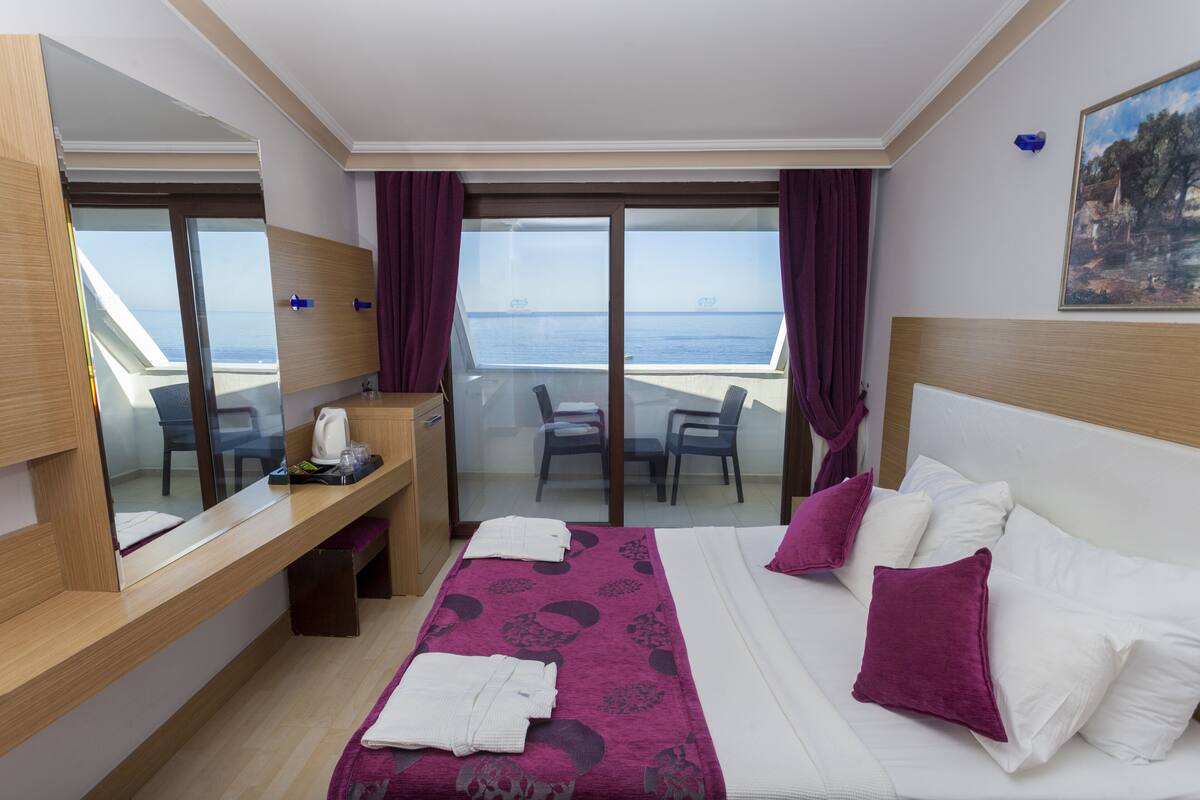 Standard Double or Twin Room, Sea View | Minibar, in-room safe, desk, free WiFi
