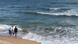 A beach with a clear sky and calm sea. - A1A Ocean Club (Flagler Beach)