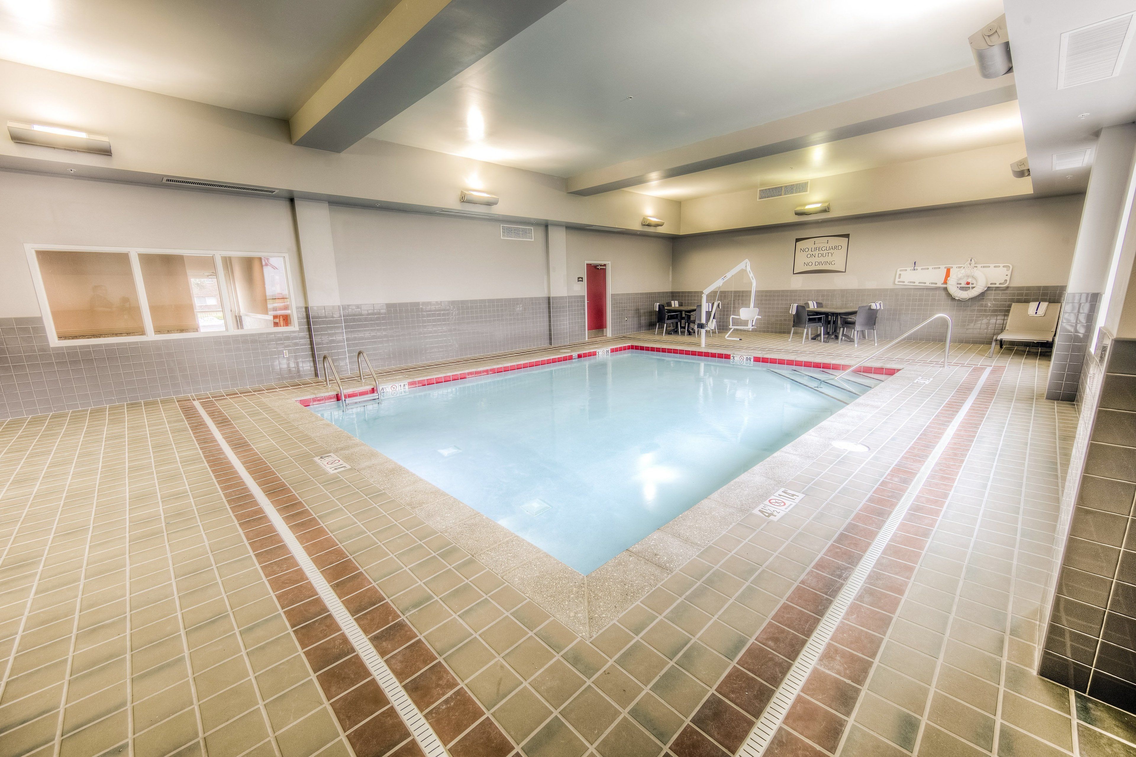 indoor pool, open 8:00 am to 11 pm, pool loungers