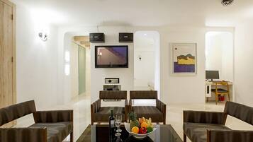 Royal Studio Suite, 1 Queen Bed, Private Pool, Mezzanine | Living area | Flat-screen TV, heated floors