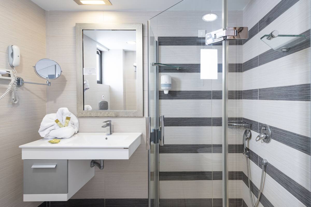 shower, free toiletries, hair dryer, bathrobes