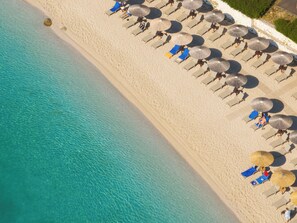On the beach, sun loungers, beach umbrellas, beach towels - Porto Galini Seaside Resort & Spa (Lefkada)