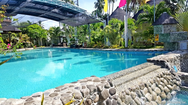 Outdoor pool, open 8:30 AM to 9:00 PM, free pool cabanas, pool loungers
