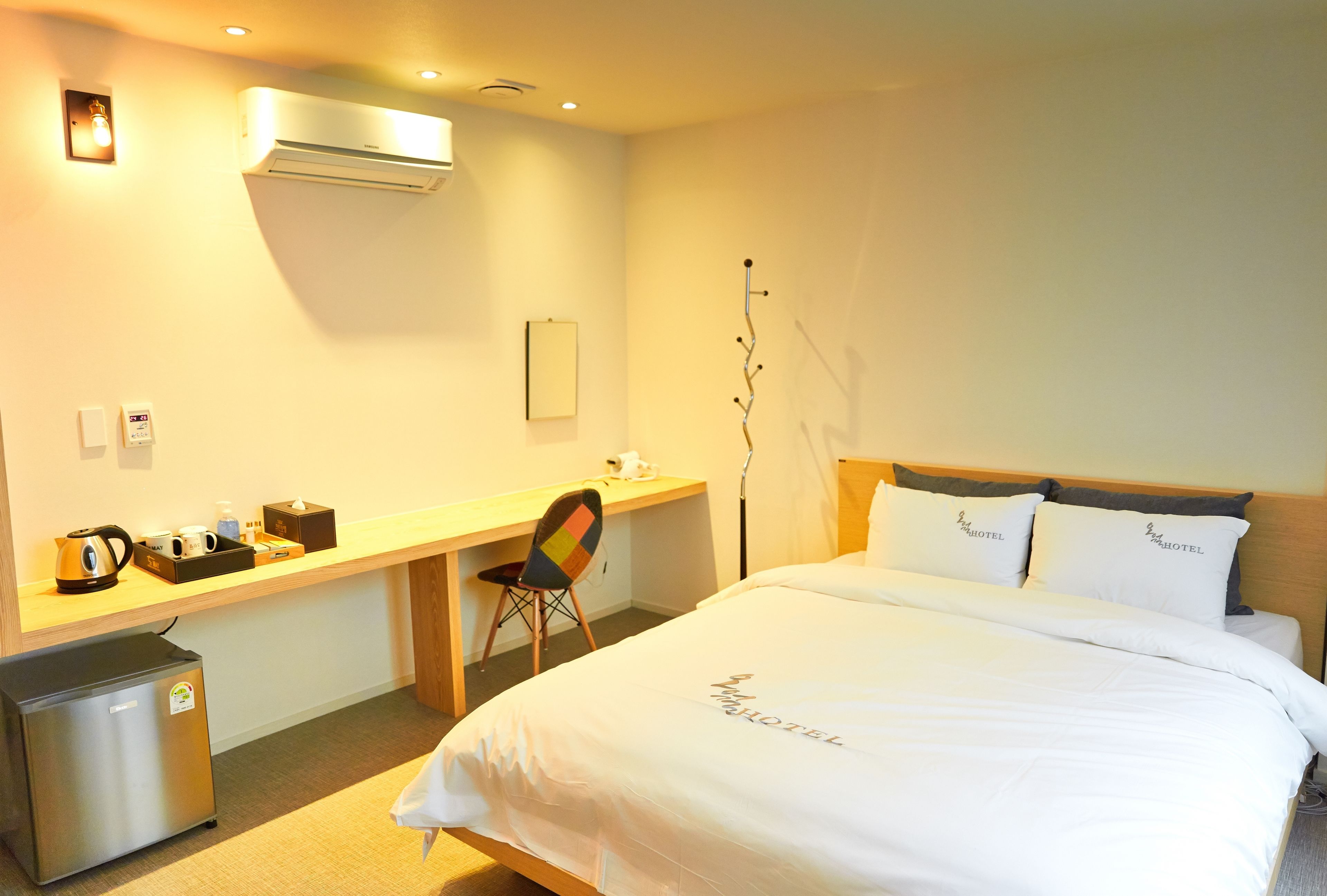 deluxe double room | premium bedding, down duvets, desk, blackout curtains