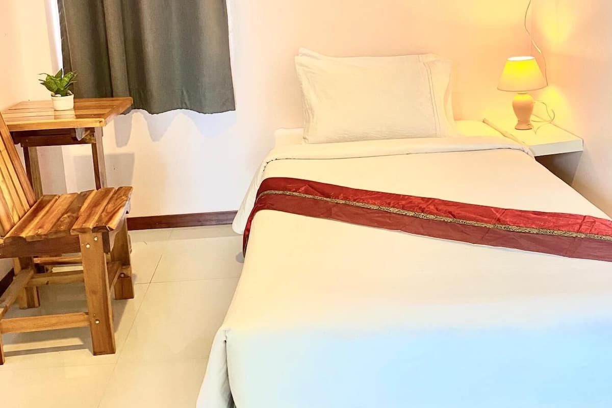 Desk, laptop workspace, blackout curtains, free WiFi