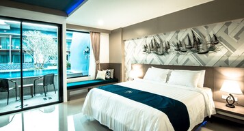 Deluxe Double Room, Pool Access | Minibar, in-room safe, desk, blackout drapes