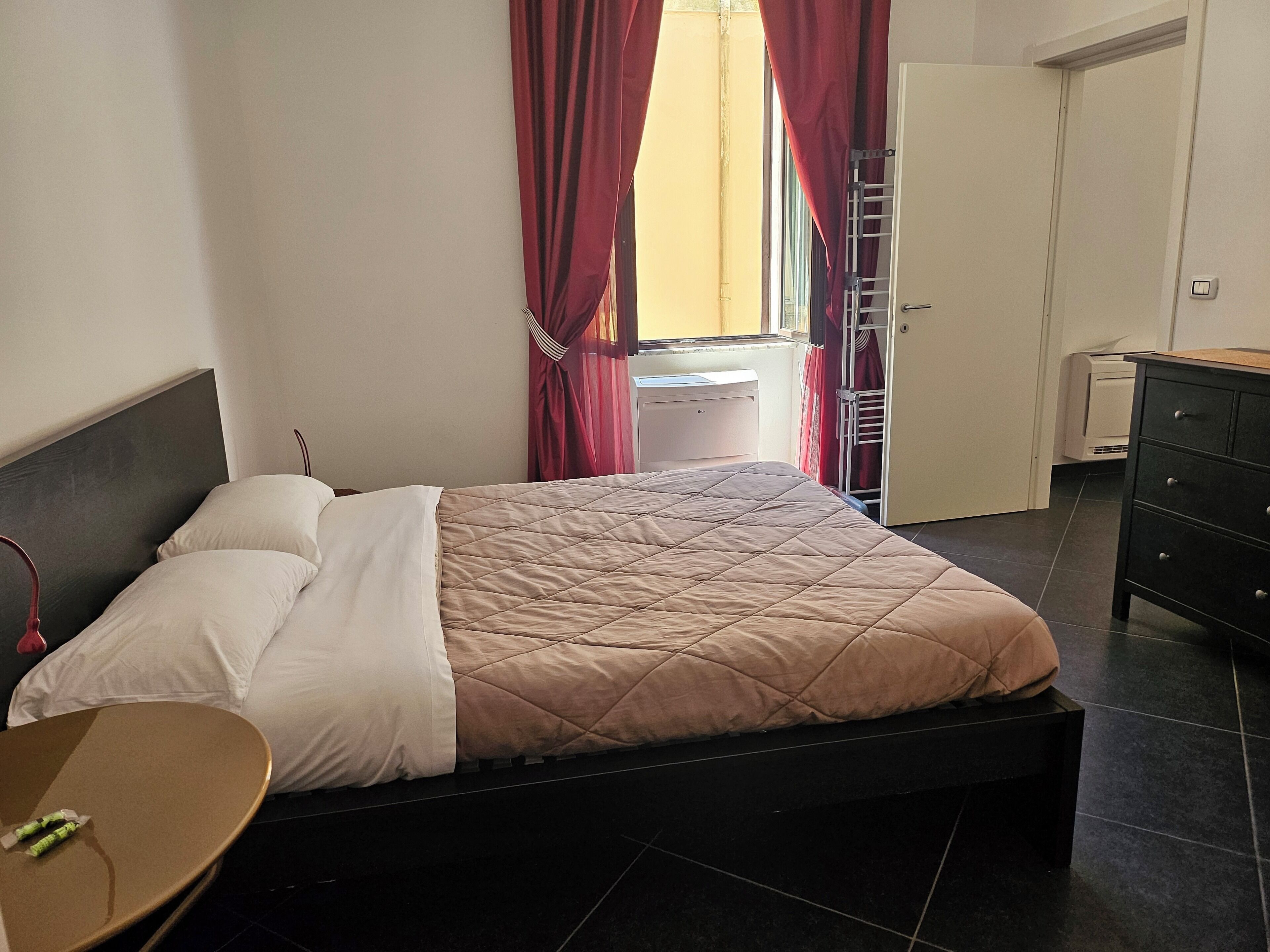 Executive Apartment | Down comforters, individually decorated, individually furnished