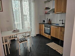 Apartamento ejecutivo | Cocina privada | Cafetera o tetera y hervidor eléctrico