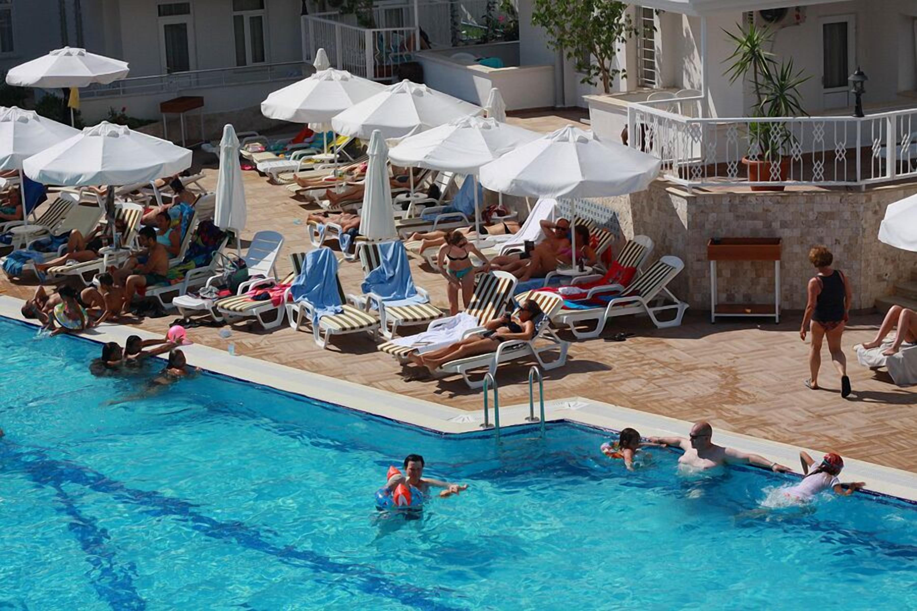 Indoor pool, outdoor pool, pool umbrellas, sun loungers