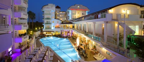 Indoor pool, outdoor pool, pool umbrellas, pool loungers