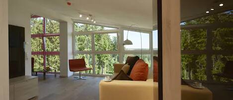 Deluxe Suite | Living room | Flat-screen TV