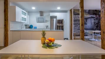 Deluxe Apartment, 2 Bedrooms | Private kitchen | Full-size fridge, microwave, stovetop, dishwasher