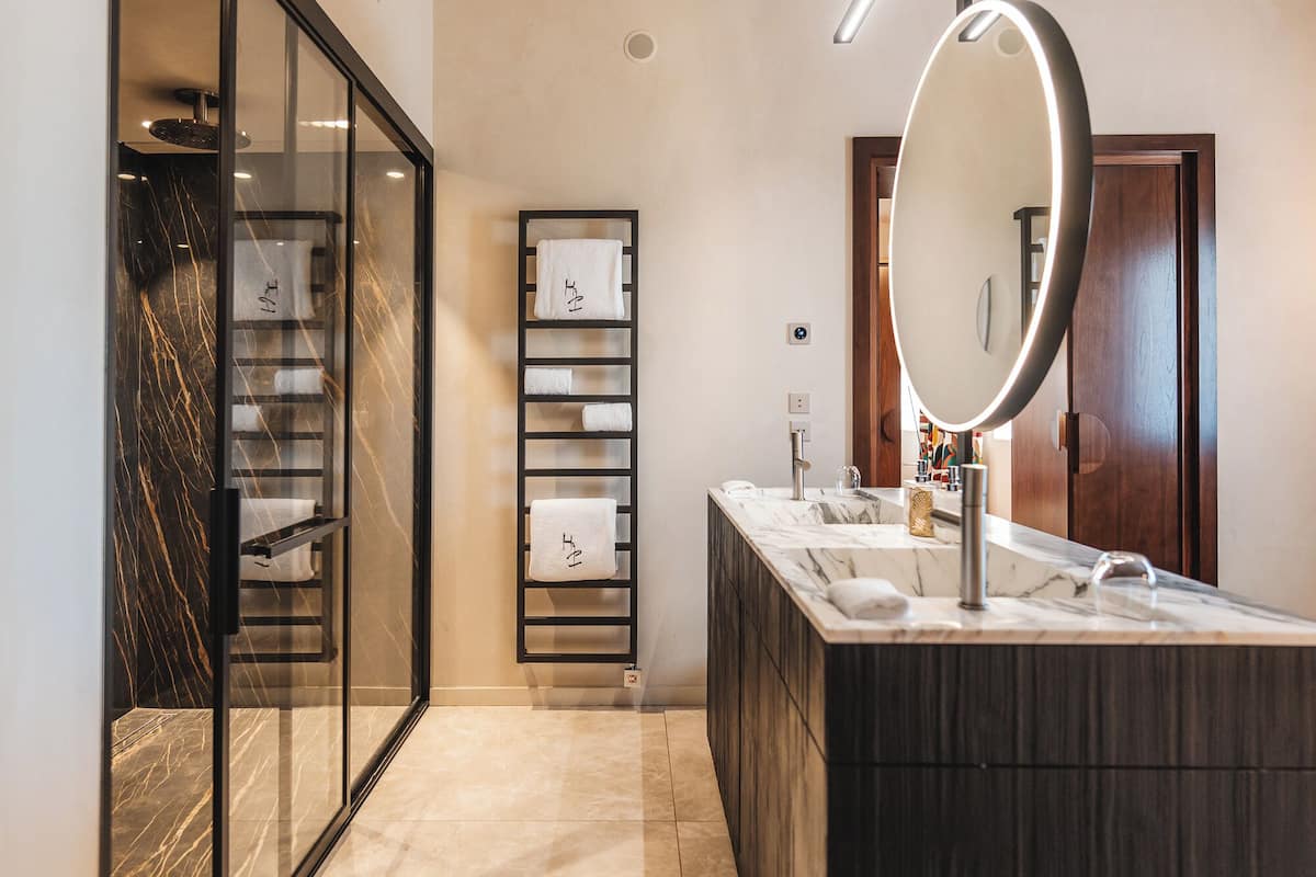 comfort suite | bathroom | separate bathtub and shower, designer toiletries, hair dryer, bathrobes