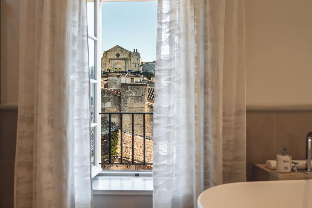 junior suite (maison de village) | bathroom | separate bathtub and shower, designer toiletries, hair dryer, bathrobes