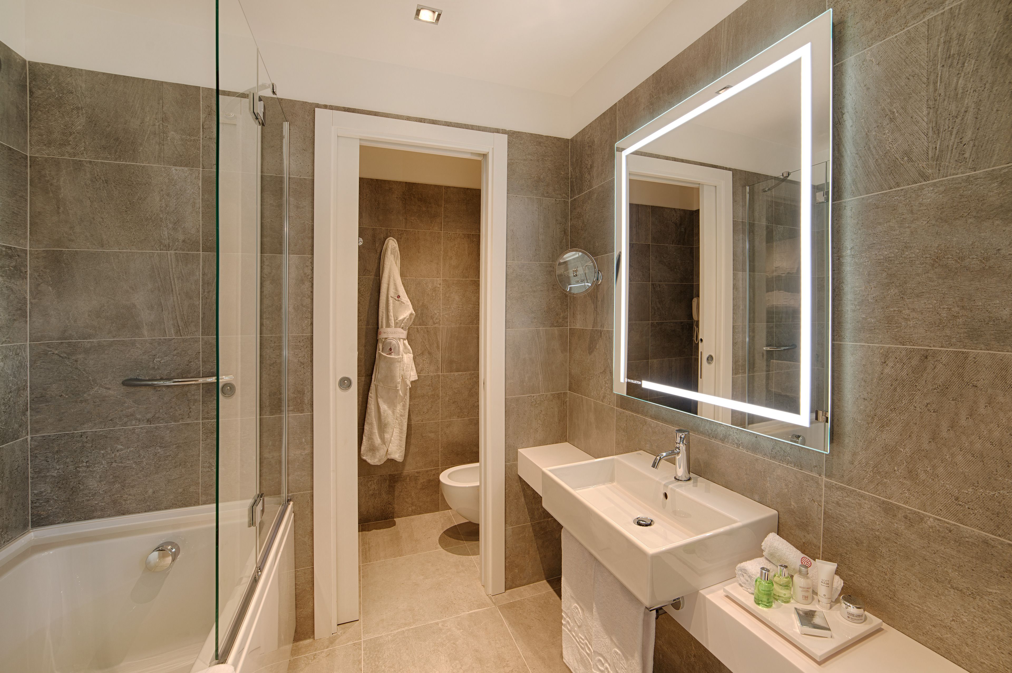 shower, eco-friendly toiletries, hair dryer, bathrobes