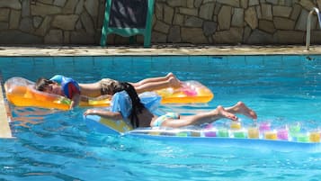 Seasonal outdoor pool, pool umbrellas