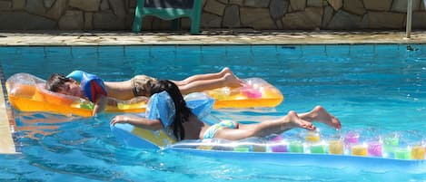 Seasonal outdoor pool, pool umbrellas