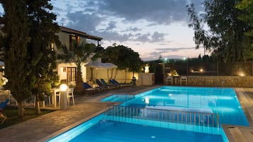 Seasonal outdoor pool, pool umbrellas