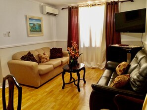 Exclusive Penthouse, 2 Bedrooms | Living room | TV - Private 2 Bedroom Beachfront Penthouse Condo Ocho Rios, Jamaica (Ocho Rios)