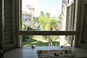 Exclusive Penthouse, 2 Bedrooms | Living room | TV - Private 2 Bedroom Beachfront Penthouse Condo Ocho Rios, Jamaica (Ocho Rios)